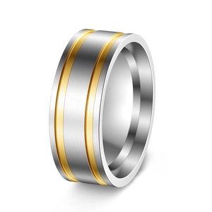 Macro view of matte brushed titanium steel ring with double gold grooved parallel lines