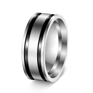 Detail view of silver brushed titanium steel ring with parallel black stripes for men