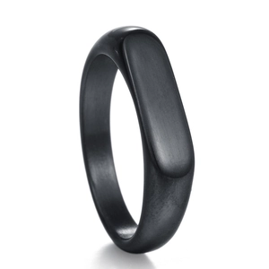 Macro shot of 4mm matte black stainless steel bar signet ring with brushed finish