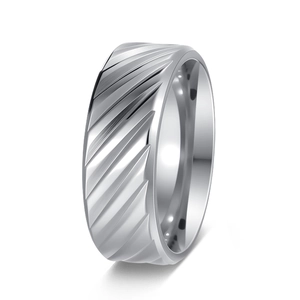 Detailed view of wide silver ring with geometric diagonal grooves and polished interior