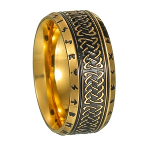 Macro detail of Nordic runes and black Celtic knot relief on wide vintage steel ring