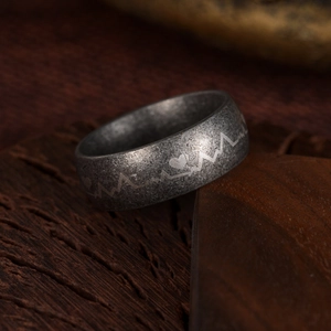 Vintage men's titanium steel ring with textured finish and heartbeat engraving