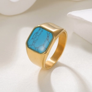 Vintage men's gold stainless steel ring featuring a rectangular turquoise stone inlay