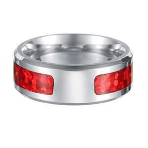 Macro shot of silver ring featuring red opal-style scale inlays and polished metal finish