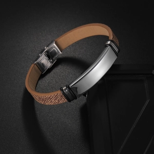 Polished stainless steel ID plate on brown woven texture strap with secure folding clasp