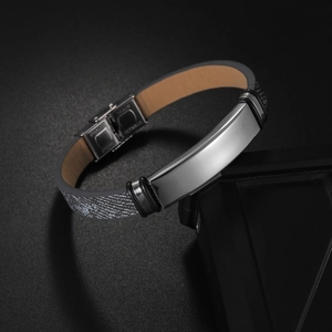 Minimalist stainless steel ID bracelet with carbon fiber texture and secure clasp