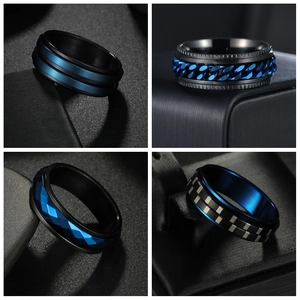 Set of four men's stainless steel rings in black and electric blue with rotating chain