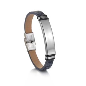 Close-up of polished stainless steel plate on blue denim strap with leather lining