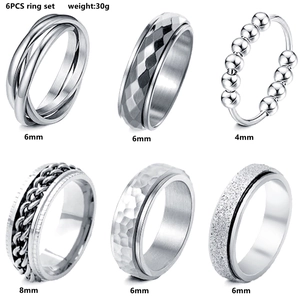 6-piece set of silver stainless steel spinner rings with matte and textured finishes