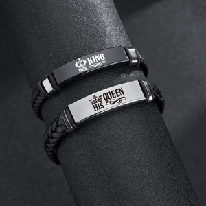 Detail of His Queen and Her King engraving on braided leather couple bracelets