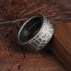Gothic 10mm stainless steel ring with spider web engraving and vintage finish