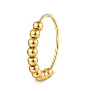 Detailaufnahme des drehbaren goldenen Anti-Angst-Rings mit zehn glatten Gleitperlen aus Metall
