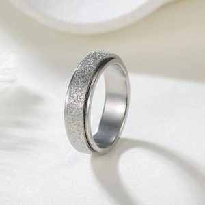 Frosted titanium steel spinner ring for couples with star-like glitter finish and silver band