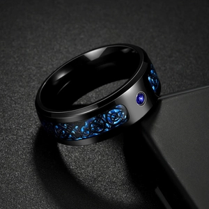 Black titanium ring with blue carbon fiber inlay and blue zircon stone for men