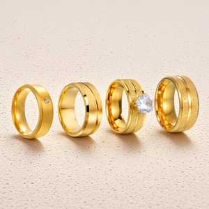 Set of four gold-plated stainless steel rings with frosted and polished finishes