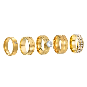 Set of five gold stainless steel rings with brushed, frosted, and diamond-set designs