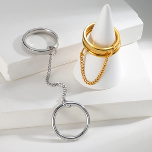 Minimalist stainless steel chain link ring set in polished gold and silver finishes