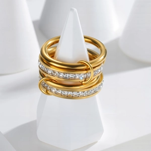Chic four-layer stacked titanium steel ring with sparkling square-cut zircons in gold