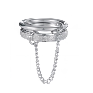 Three-piece silver stainless steel ring set with a fine chain connector and glitter finish