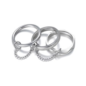 Three-piece silver stainless steel stacking ring set with link chains and matte finish