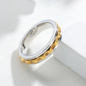 6mm two-tone spinning stress relief ring with gold wave pattern and silver steel frame