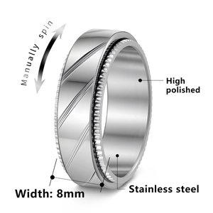 8mm stainless steel spinner ring with textured center and high polished finish