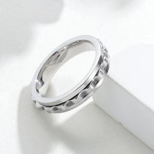 Modern 6mm rotating fidget ring for men in silver stainless steel with wave texture