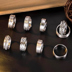 Set of 8 men's punk stainless steel rings with spinning chains and Greek key patterns