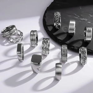 11-piece silver titanium steel ring set for men featuring square signet and band styles