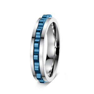 Close-up of 6mm silver stainless steel ring featuring a blue rotatable gear design