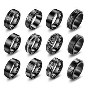 Detailed grid showing twelve different black punk style rotatable stainless steel rings