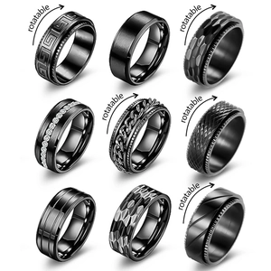Set mit 9 schwarzen Edelstahl-Spinner-Ringen für Herren mit diversen Texturen