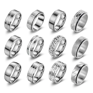 Detailed grid view of twelve silver stainless steel rings with various textured patterns