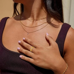 Golden coin pattern stainless steel ring with hollow geometric design for women