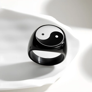 Polished black signet ring featuring a classic Yin Yang Tai Chi symbol on white tray