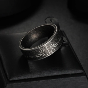 Vintage stainless steel ring featuring a unique engraved fish hook pattern in matte finish