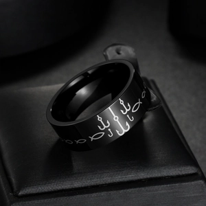 Men's black stainless steel ring with silver fish hook pattern in a jewelry box