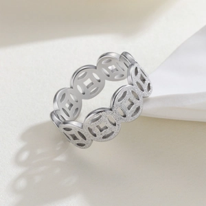 Silver vintage hollowed copper coin ring with frosted and polished titanium steel finish