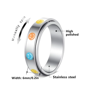 Polished 6mm stainless steel spinner ring with colorful smiley face patterns