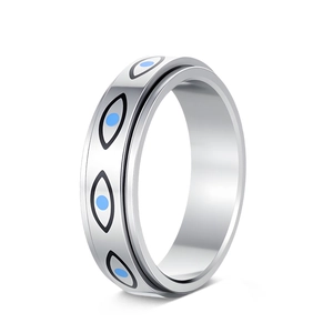 Detail view of the rotatable anti-stress spinner ring featuring a blue enamel evil eye motif