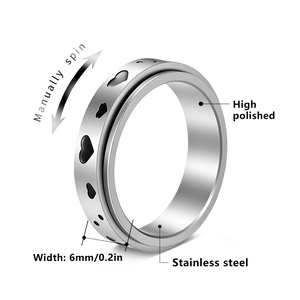 6mm high polished stainless steel spinner ring with heart cutouts and manual spin feature
