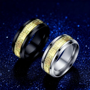Luminous crown rings in black and silver stainless steel with gold relief details