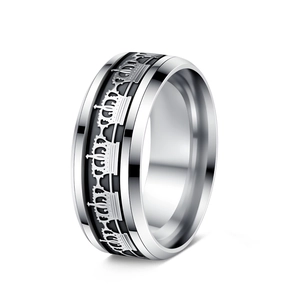 Detailed close-up of crown pattern on stainless steel ring with black enamel finish