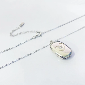 S925 sterling silver rectangular locket necklace with heart pattern and zircon