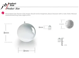 Comparaison de taille de boucles d'oreilles boules 8mm avec règle et pièce de monnaie