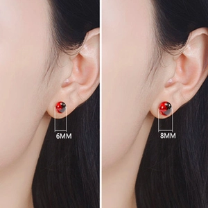Comparison of 6mm and 8mm red and black spiral pattern s925 silver stud earrings