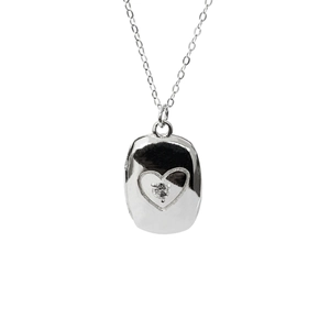 S925 silver heart locket necklace with zircon pendant on a white background
