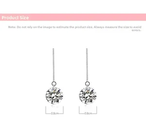 Detailed view of long sterling silver tassel earrings with 0.8cm round cubic zirconia