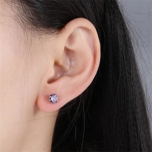 Minimalist s925 sterling silver stud earrings featuring a purple round zircon in claw setting