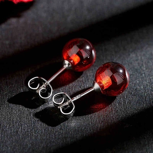 S925 sterling silver stud earrings with round translucent deep red zircon stones